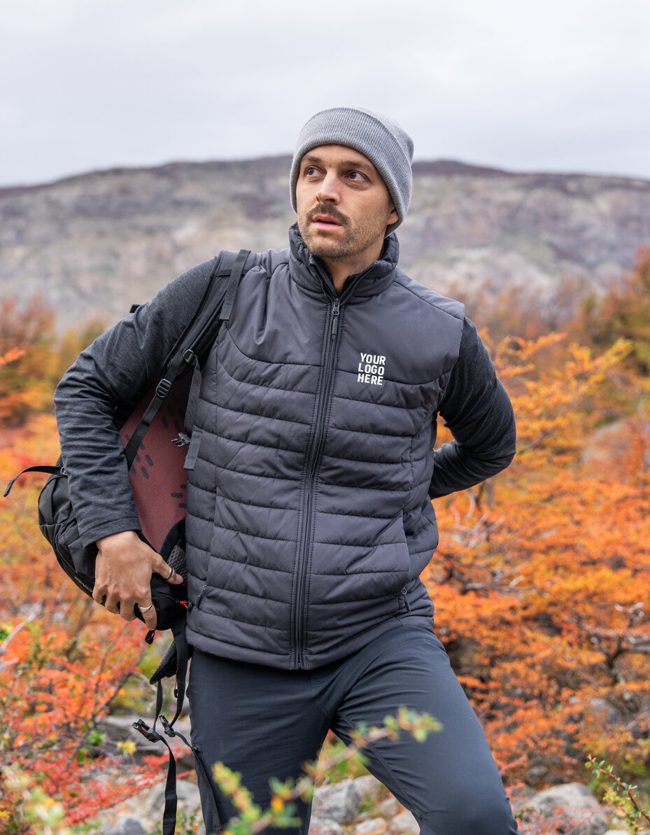 Man in a black Stormtech softshell vest
